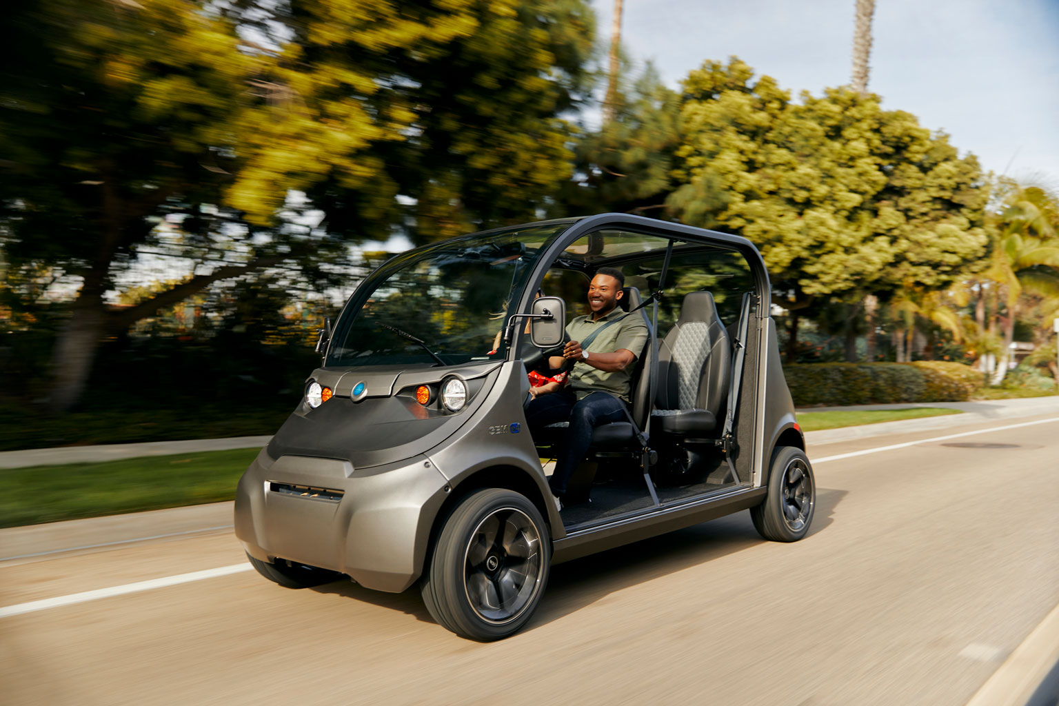 Polaris Gem lifestyle driving down road