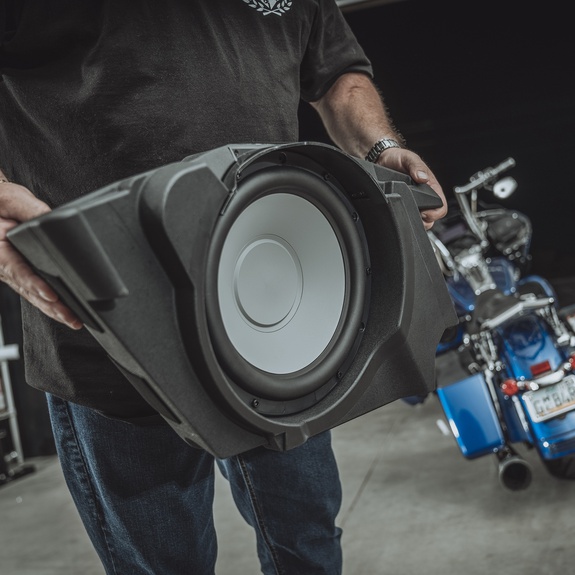 Installation Shot of Loading Subwoofer into Saddlebag