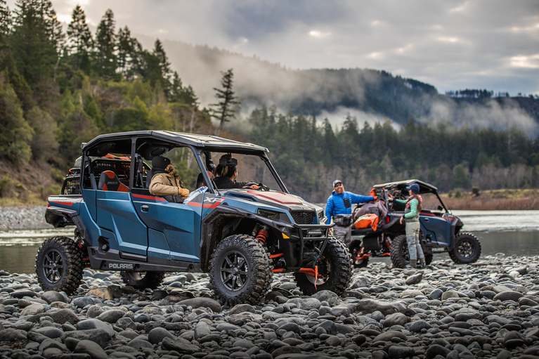 2022 Polaris General XP 1000 Trailhead LE matte blue slate metallic lifestyle at the river bed